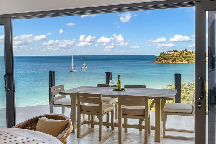 Ocean 19 | Oceanfront Living, 3-bedroom villa for sale in St Mary, Antigua & Barbuda - dining terrace overlooking the bay