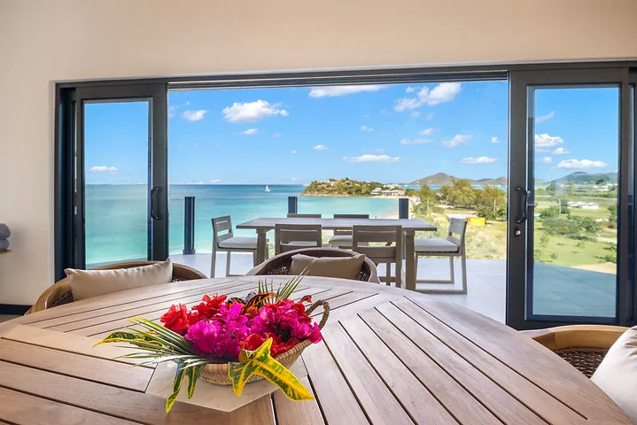Ocean 19 | Oceanfront Living, 3-bedroom villa for sale in St Mary, Antigua & Barbuda - dining terrace with sea views