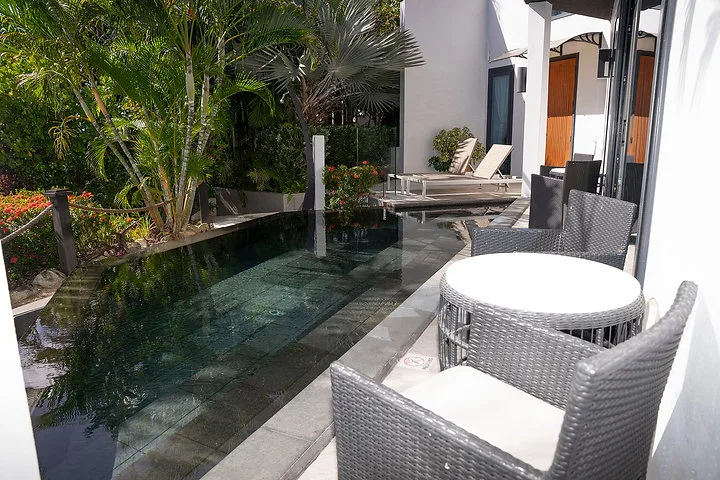 Villa Oasis | Private Garden and Ocean Views, 2-bedroom villa for sale in St Mary, Antigua & Barbuda - pool terrace with outdoor seating