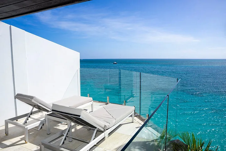 Villa Oasis | Private Garden and Ocean Views, 2-bedroom villa for sale in St Mary, Antigua & Barbuda - sun loungers above the sea