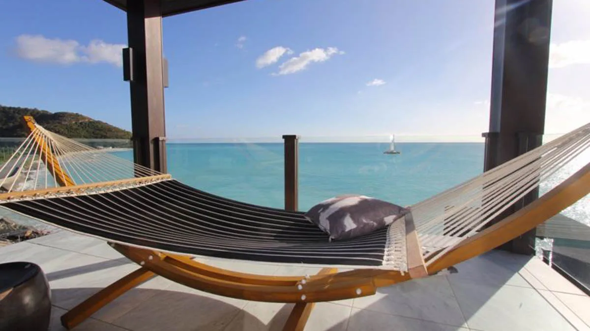 Tamarind Hills Villas | Luxury Beachfront Residences in Antigua, 1-bedroom villa for sale in St Mary, Antigua & Barbuda - hammock on the terrace with sea view
