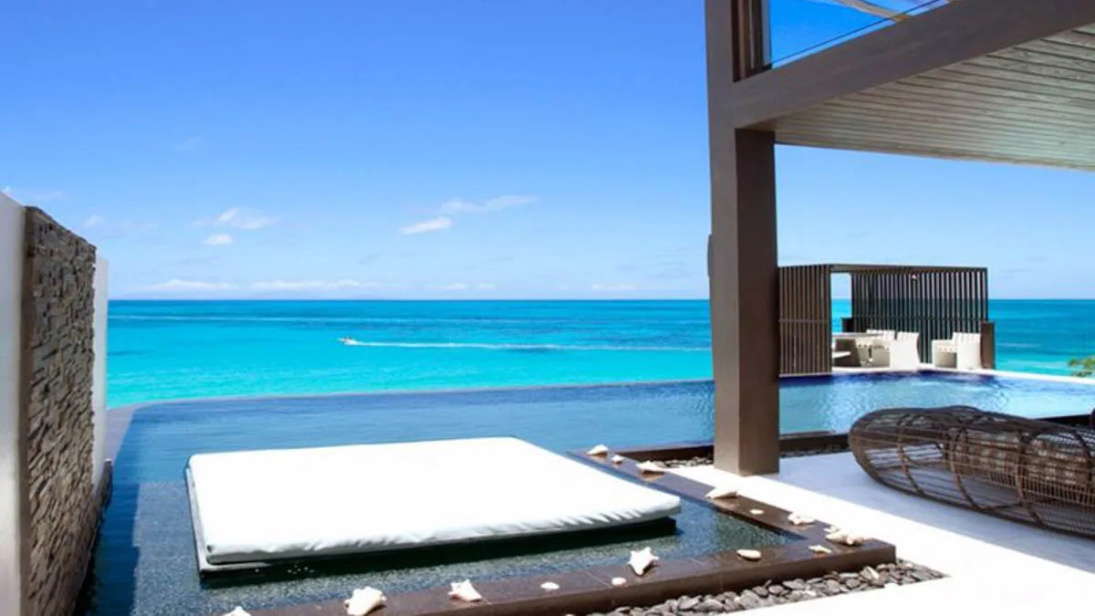 Tamarind Hills Villas | Luxury Beachfront Residences in Antigua, 1-bedroom villa for sale in St Mary, Antigua & Barbuda - plunge pool with daybed and sea view