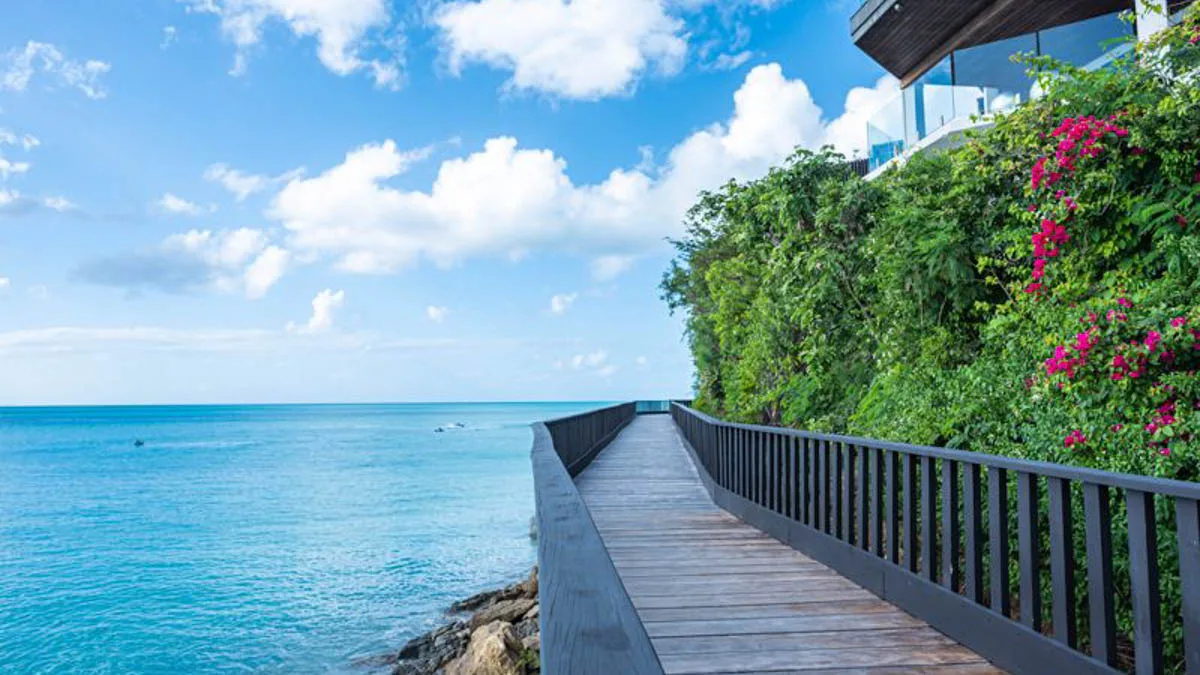 Tamarind Hills Villas | Luxury Beachfront Residences in Antigua, 1-bedroom villa for sale in St Mary, Antigua & Barbuda - boardwalk along the shore