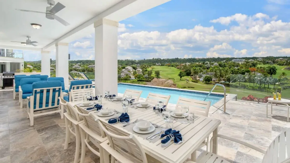 Jasmine Grove 2 | Modern Golf Course Villa at Royal Westmoreland, 4-bedroom villa for sale in St James, Barbados - covered terrace dining overlooking the pool and fairways