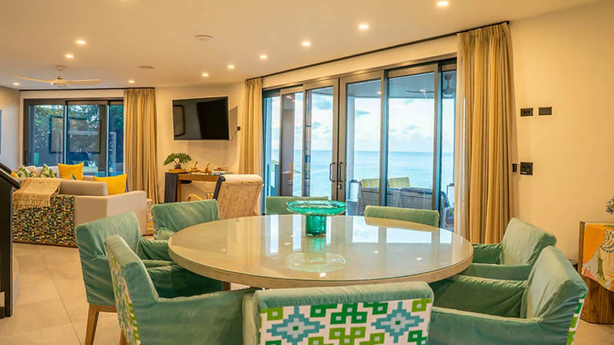 Villa Ocean 15 | Oceanfront Infinity Pool, 4-bedroom villa for sale in St Mary, Antigua & Barbuda - dining table with sea view