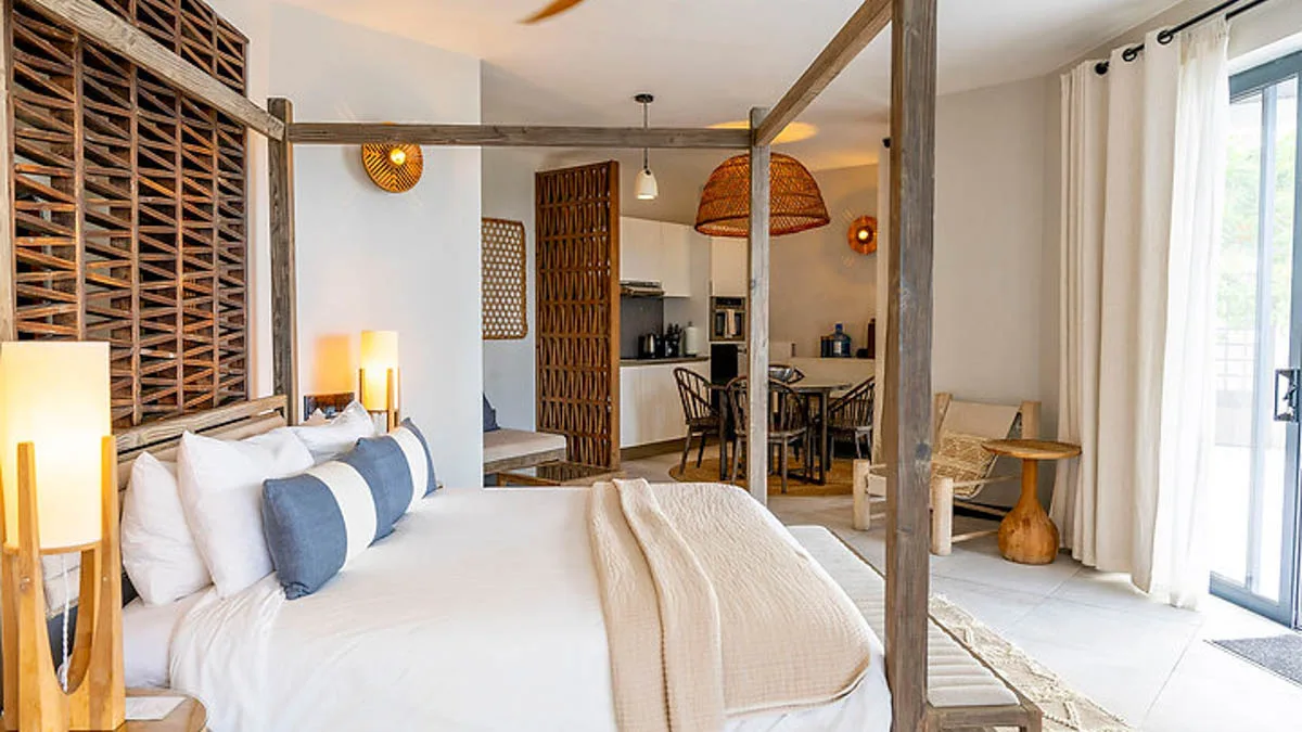 Ocean Suite K28 | Elevated Ocean Views, 1-bedroom villa for sale in St Mary, Antigua & Barbuda - bedroom with kitchenette beyond